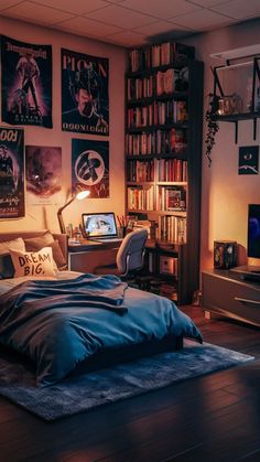 a bedroom with posters on the wall and a bed in front of a tv set