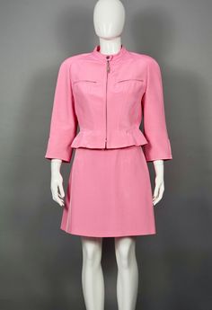 Features - 100% Authentic MUGLER. - Candy pink blazer/ jacket and skirt suit. - Jacket is nipped in waist, with 3/4 sleeves and zipper closure at the center. - 2 zipped pockets on bust and slight shoulder pads. - Skirt is A line cut with zipper closure at the back. - Skirt and blazer are fully lined. - Label reads: MUGLER, Size 36. - Fabric content: 58% Acetate 22% Viscose, 20% Polyamid. - Excellent vintage condition. Measurements taken laid flat, please double bust, waist and hips : JACKET/ BLA Vintage Mugler, Vintage Skirt Suit, Suit Measurements, Pink Jacket Blazer, Gingham Jacket, Womens Suits, Pink Blazer, Candy Pink, Pink Jacket