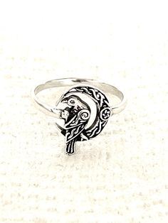 "Handcast 925 Sterling Silver Raven on Celtic Crescent Moon Ring                                      This gorgeous ring was handcast by me in my studio from solid stamped nickle free 925 Sterling Silver. The ring measures approx. 0.59\" tall, tapering down to 0.1\" in back Weight approx. 3 grams depending on ring size. The ring can be custom sized from size 6 up to size 10 for no additional charge. Jewelry Gift Box Handling time approx. 5 days Domestic Standard shipping $4 Domestic Priority Mai Nickel Free Sterling Silver Crescent Rings, Nickel Free Silver Crescent Rings, Silver Crescent Rings Nickel Free, Nickel-free Sterling Silver Crescent Rings, Nickel-free Crescent Sterling Silver Rings, Nickel-free Silver Crescent Rings, Crescent Moon Ring, Gorgeous Ring, Moon Ring