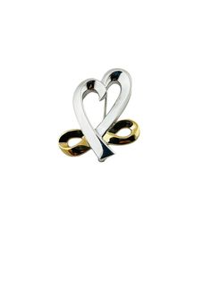 Tiffany & Co. Pablo Picasso 18K Yellow Gold and Sterling Silver Open Heart Infinity Brooch This vintage Tiffany & Co. Pin was designed by Pablo Picasso Approx. 1 1/2" in length and 1 1/4" wide. Stamped Pablo Picasso 925 Tiffany & Co. 750 15.1 g / 9.7 dwt Very good preowned condition. Will be shipped priority mail with insurance. AD10012023/17KC400 Elegant Silver Heart-shaped Brooch, Elegant Silver Heart Brooch, Elegant Silver Heart-shaped Brooches, Elegant Silver Heart Brooches, Gold Sterling Silver Brooch For Anniversary, Gold Sterling Silver Brooches For Anniversary, Elegant Gold Brooch For Valentine's Day, Elegant Brooch For Valentine's Day, Elegant Gold Brooches For Valentine's Day