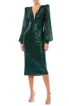 Glistening sequins enliven a scene-stealing midi dress framed by pronounced shoulders with long blouson sleeves. 46" length Deep V-neck Long sleeves Lined 100% polyester Spot clean Imported Pointed Shoulder, Short Wedding Guest Dresses, Bishop Sleeve Dress, Unique Prom Dresses, Plunge Neckline, Bride Clothes, Mac Duggal, Bishop Sleeve, Mesh Overlay