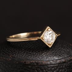 This perfectly elegant engagement ring was inspired by the Gilded Age (1870 - 1900), a period in American history that was characterized by rapid industrialization and streamlined style. For our ring's setting, we borrowed some of the stylistic elements from the era - clean straight lines, a hint of milgrain - and added an antique .40 carat old European cut diamond that would have been popular at this point in history. The low, flat profile is a modern improvement designed for maximum comfort. Flat Engagement Rings, Milgrain Engagement Ring, Elegant Engagement Ring, The Gilded Age, Milgrain Ring, Elegant Engagement Rings, Gilded Age, Art Deco Engagement, Right Hand Rings