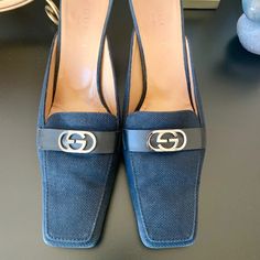 Beautiful Gucci Gg Logo Mules In Excellent Pre-Loved Condition. Canvas And Leather Material. Shoes Have Some Wear And Scuff On Canvas, Soles And Heels. Heel Cap Has Been Replaced. Size 9b But Runs Big And Fits More Like 91/2-10. Gucci Black Square Toe Heels, Gucci Elegant Square Toe Heels, Elegant Gucci Square Toe Heels, Gucci Designer Slip-on Heels, Gg Logo, Heel Caps, Gucci Black, Gucci Shoes, Leather Material