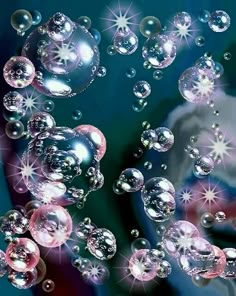 soap bubbles are floating in the air