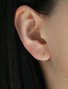 Tiny open circle stud earring - super cute and very versatile, you can pair it with any other earrings or jewelry. D E T A I L S * Circle is 3 mm * 18 gauge post * 16k gold over sterling silver // white gold over sterling silver * Nickel free and hypoallergenic S H O W   U S   S O M E  ♥ Instagram: @Minthologie Facebook: facebook.com/Minthologie Small Circle Stud Earrings, Earring Cartilage, Helix Earring, Conch Earring, Cartilage Earring, Helix Earrings, Circle Earrings Studs, Small Earrings Studs, Circle Studs