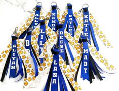 blue and white lanyards with smiley faces on them