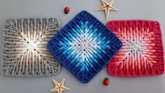 three crocheted squares with stars on them