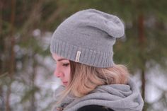 "Very soft, lightweight, slouchy beanie hat to keep you warm and cozy. Hat is made of 100% peruvian Baby alpaca yarn. Alpaca is a soft, silky and durable fibre with unique thermal properties due to microscopic air bubbles found inside the hair. These bubbles allow the user to \"breathe\" through the fibres on hot days and in much the same way, to retain body heat in cold climates. It is also elastic and not inflammable. While similar to sheep's wool, it is warmer, not prickly, and has no lanolin Slouchy Beanie Hat For Everyday, Slouchy Beanie Hats For Everyday Wear, Slouchy Soft Knit Beanie For Everyday, Slouchy Cozy Beanie, Cozy Everyday Beanie One Size, Soft Everyday Beanie, One Size Fits Most, Slouchy Knitted Beanie For Everyday, Slouchy Soft Knit Cozy Beanie, Casual Soft Beanie Bonnet