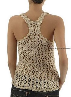 the back of a woman's top with crochet