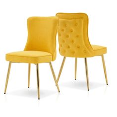 two yellow chairs sitting next to each other