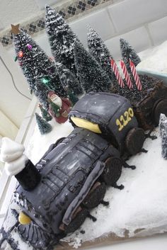 a cake made to look like a train in the snow