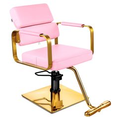 a pink office chair with gold frame and foot rest on top of a golden pedestal