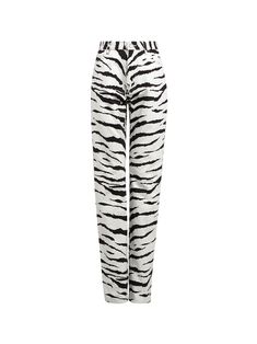 Alaïa's Tiger Print Jeans feature an all-over, black and white animal print on a high-waisted, straight cut denim pant. They are completed with a zip and button fastening. Pair with the matching trench coat to complete the look.[tab] Composition: 100% Cotton Denim Size and Fit: Runs True to Size Care Instructions: Dry Clean Only Origin: Made in Italy SKU: AZZ49P04 Questions about size, fit, or how to style? The KZ team is here to help you look and feel your best! Chat with our stylists via the i Azzedine Alaia, Print Jeans, White Zebra, Printed Jeans, Printed Denim, Tiger Print, Printed Pants, Girl Costumes, Denim Pant