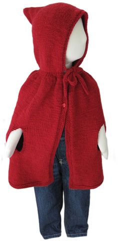 a stuffed animal wearing a red sweater and jeans