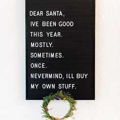 a sign that says dear santa i've been good this year mostly sometimes once never mind, ill buy my own stuff