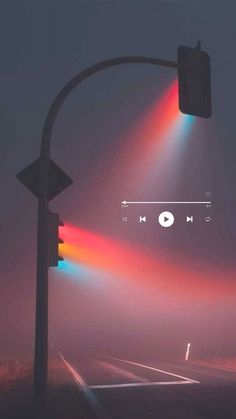 an image of a street light with colored lights on it and the word music below