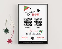 a poster on the wall next to a christmas tree and ornament with a qr code