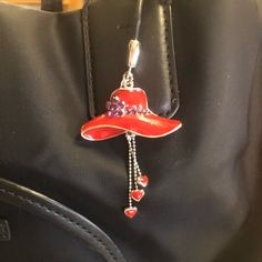 Adorable Red Hat Cookie Lee Purse Charm. Sparky Purple Crystals Catch The Light Beautifully! Just Thread Through Your Purse Handle For Some Cute Bling! Red Casual Mini Hat For The Beach, Casual Red Mini Hat For Beach, Red Hats For Spring Gifts, Red Spring Hat As Gift, Red Spring Hats As Gift, Red Spring Hat For Gift, Red Hats As Spring Gift, Adjustable Red Hats For Holiday, Adjustable Red Hat For Holiday