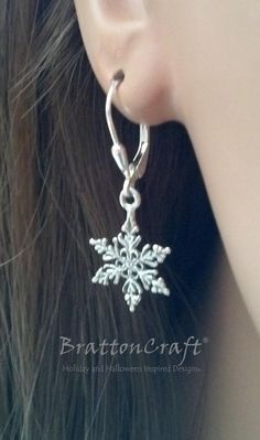 These sterling silver snowflake earrings are very pretty! The detailed snowflake charm is sterling silver and measures (without the attached ring) 14.5mm or .57 inches in diameter. The leverback is sterling silver with a tear drop accent. These lovely earrings are ready to ship and will arrive in a gift box. Check out the matching Snowflake Necklace and other snowflake jewelry here: https://www.etsy.com/shop/BrattonCraft?ref=listing-shop2-all-items-count&search_query=snowflake Check out othe Sterling Silver Snowflake Jewelry For Winter, Sterling Silver Jewelry For Winter Gifts, Silver Jewelry As Winter Gift, Silver Jewelry For Winter Gift, Sterling Silver Snowflake Jewelry, Silver Snowflake Jewelry For Holidays, Sterling Silver Snowflake Earrings, Silver Snowflake Jewelry For Christmas, Sterling Silver Jewelry For Christmas