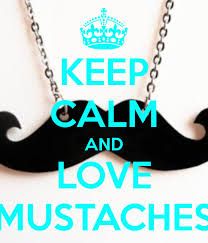 a black moustache necklace with the words keep calm and love mustaches