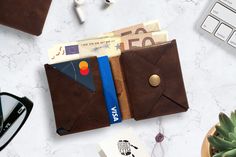 Looking for a classy leather bifold designed to carry all your essentials, including coins?. The 'Le No03' Minimalist Premium Quality Origami Bifold Leather Wallet with coins has got you covered. It perfectly fits cards, cash, and coins. Also includes a hidden pocket for your less frequently used items. Carefully made using a high-quality single piece of top-grain and certified vegetable-tanned Italian leather, this beautiful wallet is a must-have accessory for you fashionable men out there. Wit Modern Leather Trifold Wallet For Gifting, Modern Leather Trifold Wallet For Gift, Modern Leather Trifold Wallet As Gift, Modern Envelope Wallet For Gifts, Modern Envelope Wallet As A Gift, Modern Envelope Wallet For Gift, Modern Envelope Wallet Gift, Origami Cards, Wallet With Coin Pocket