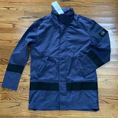 Nwt Men’s Small Navy Lightweight Calvin Klein Raincoat Jacket. Zip In Hood In Collar. Zips And Snaps In Front. Drawstring Inside To Create A More Custom Fit. Color Is Most Like Second Picture Calvin Klein Outdoor Fall Outerwear, Blue Nylon Techwear Outerwear, Blue Techwear Outerwear With Pockets, Casual Calvin Klein Blue Outerwear, Calvin Klein Casual Blue Outerwear, Navy Nylon Long Sleeve Outerwear, Navy Functional Outerwear For Fall, Navy Long Sleeve Nylon Outerwear, Navy Long-sleeve Nylon Outerwear