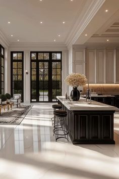 an elegant kitchen with marble floors and white walls