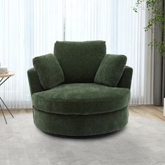 a green chair sitting on top of a white rug