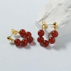 Celebrate the New Year in style with our elegant red agate beaded earrings. Made with durable S925 silver and featuring a thoughtful design, they are the perfect accessory to add joy and sophistication to any outfit. Metal: 18K Recycled Gold Plated On Brass/925 Sterling Silver Ear Needle Gemstone: Red Onyx Agate Dimensions: 4mm/6mm Dimensions: 4mm earrings 18mm/6mm earrings 23mm Single Weight: 1.2g/2.2g 4mm Earrings, Onyx Bead, Jewelry Ring Box, Earrings Hoop, Red Agate, Elegant Red, Enamel Earrings, Large Earrings, Onyx Stone