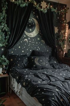 a bed with stars and moon decorations on the headboard, in a bedroom decorated for christmas