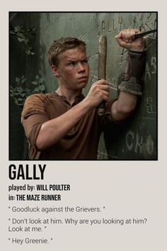 a man holding a baseball bat in front of a wall with writing on it that says,'gally played by will poultter in the maze runner '