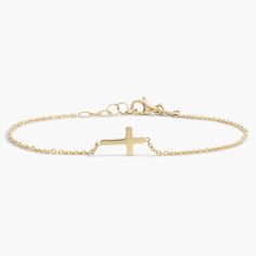 Meaningful and modern, this 14k yellow gold mini cross bracelet makes a strong symbolic statement while blending seamlessly with your other jewelry wardrobe essentials. Jewelry Wardrobe, Mini Cross, Birthday List, Cross Bracelet, Clothing Inspiration, Cross Jewelry, Blue Nile, Metal Bracelets, Christmas Wishlist