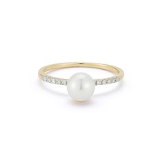 14kt Pearl Sphere Ring Simple and timeless. This beautiful ring is made in New York City of solid 14kt yellow gold, handset with brilliant diamonds and a carefully selected cultured pearl. 14kt Yellow Gold 0.98gm Gold 0.12ct Diamonds 6mm Cultured Freshwater Pearls Made in New York City Sizes 6, 6.5, and 7 available in stock. Classic Yellow Gold Pearl Ring With Single Diamond, Classic Yellow Gold Pearl Ring With Diamond, 14k Gold Pearl Ring With Diamond Accents, Yellow Gold Rings With Diamond Accents And Pearl, Yellow Gold Pearl Diamond Ring With Accents, Sphere Ring, Ring Simple, Nova York, Pearl Set