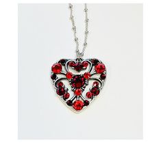 Lend romantic allure to your look with the fiery crystals that accentuate this filigree heart pendant suspended on a dainty station chain. From Anne Koplik Designs, Inc. Filigree Heart, Red Crystals, Heart Pendant, Silver Tone, Jewelry Necklaces, Jewelry Making, Crystals, Chain, Pendant