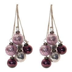 pink and silver ornaments hanging from strings