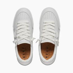 Women's Lay Day Seas Shoes in White Leather | REEF® Comfortable Lace-up Skate Shoes With Rubber Sole, White Sole Platform Sneakers For Skateboarding With Round Toe, Comfortable Lace-up Skate Shoes With Vulcanized Sole, Sporty Slip-on Sneakers With Perforated Toe Box For Everyday, Sporty Wedge Sneakers With Vulcanized Sole, Casual Lace-up Wedge Sneakers With Rubber Sole, Urban Lace-up Skate Shoes With Textured Sole, Casual Custom Sneakers With Vulcanized Sole For Skateboarding, Casual Custom Sneakers For Skateboarding With Vulcanized Sole