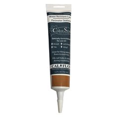 a tube of watercolor paint with brown and white colors on the inside of it