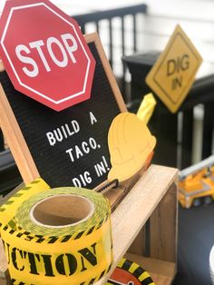 construction signs and caution tape are on display