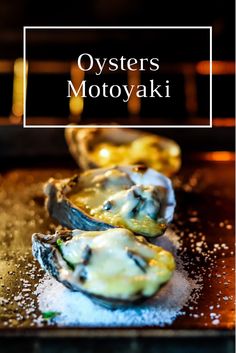 oysters on a baking sheet with the words oysters motovyaki above them