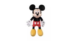 the mickey mouse stuffed animal is wearing red shorts and yellow shoes with his ears up