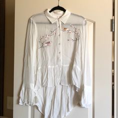 Beautiful Cream Blouse Embroidered With Birds And Flowers; Great For Dress Up Or Casual. Nwt Casual Embroidered Shirt For Daywear, Spring White Embroidered Shirt, Spring Long Sleeve Blouse With Embroidery, Spring Daywear Shirt With Floral Embroidery, Long Sleeve Embroidered Top For Spring Daywear, Spring Embroidered Long Sleeve Top, Spring Embroidered Long Sleeve Top With Hem Detail, Spring Embroidered Blouse, Embroidered Long Sleeve Blouse For Brunch