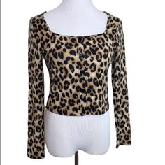 One Clothing Leopard Print Crop Knit Top Button Detail Front Nonfunctional Long Sleeves Super Soft Approximate Measurements (In Inches And Laid Flat): Length: 18” Pit To Pit: 17 1/2” Thank You For Checking Out My Closet! Please Let Me Know If You Have Any Questions. A19 Fall Leopard Print Tops With Buttons, One Clothing, Knit Crop Top, Button Detail, Knit Top, Black And Brown, Leopard Print, Let Me, Long Sleeves