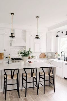 White Cabinet Kitchen With Black Hardware, White Counter With White Cabinets, White Kitchen Ideas Black Hardware, Black Handles White Cabinets Kitchen, Black Kitchen Fixtures White Cabinets, White Cabinets Black Fixtures, White Kitchen Cabinet Remodel, Timeless Black And White Kitchen, Kitchen Ideas With Black Accents