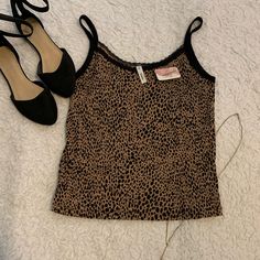 Brand New With Tags. Lace Detail Leopard Print Ribbed Tank, Size Medium. Sweat Tour, Cheetah Print Tank Top, Leopard Tank Top, Thrift Wishlist, Leopard Print Tank Top, Cheetah Print Top, Pretty Handwriting, Cut Tank Top, Black V Neck Sweater