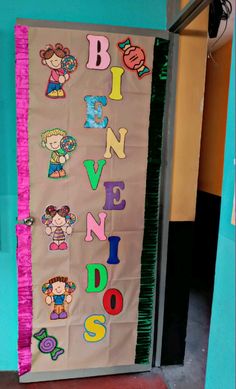 a bulletin board with letters and pictures on it