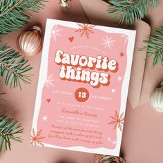 a pink and white holiday card with the words favorite things on it, surrounded by christmas ornaments