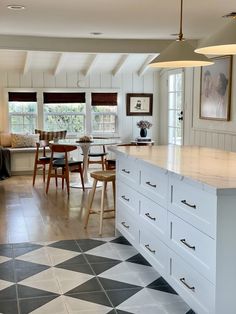 the kitchen is clean and ready to be used as a dining room or family room