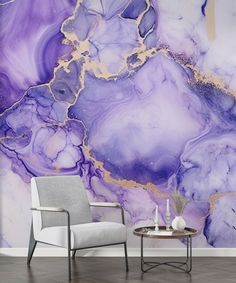 a chair and table in front of a wall with purple marble design on the walls