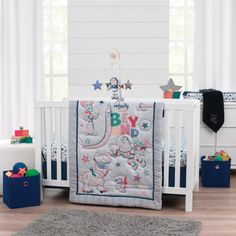 a baby crib bedding set in a nursery