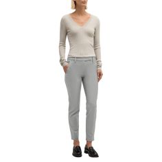 Brunello Cucinelli cropped slim-fit pants in cotton  Mid-rise; sits high on hip Button/zip fly; belt loops  Side slip pockets; back welt pockets  Cropped fit Cotton Made in Italy Chic Stretch Chinos For Business Casual, Slim Fit Mid-rise Chinos For Work, Casual Fitted Breeches For Workwear, Fitted Mid-rise Chinos With Belt Loops, Fitted Straight Leg Breeches For Workwear, Chic Fitted Chinos For Fall, Chic Fitted Ankle-length Chinos, Chic Fitted Fall Chinos, Slim Fit Chinos With Belt Loops For Work